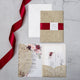 Glitter Gold burgundy laser cut Pocket Fold invitation with Red Satin belly band and Floral backer
